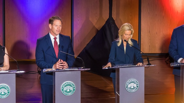 Daniel Davis and Donna Deegan pictured at the mayoral debate hosted by Jacksonville University Public Policy Institute and WJXT Channel 4. 