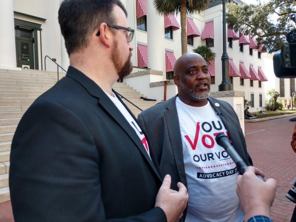 Neil Volz and Desmond Meade of the Florida Rights Restoration Coalition on March 12