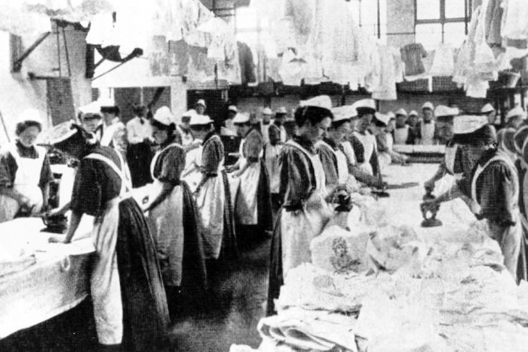 An undated image of women in a Magdalene Laundry where they are seen ironing clothes.