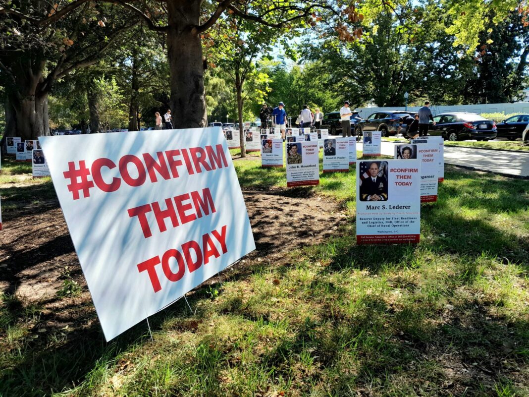 Tuberville opponents plant hundreds of signs outside U.S. Capitol in protest of blockade